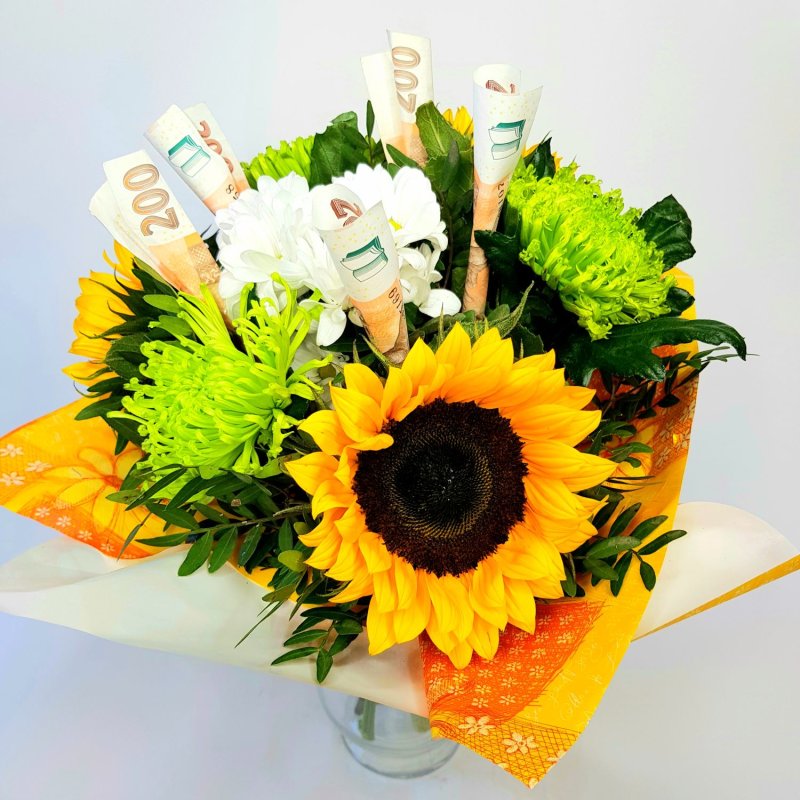 Kytice z peněz a slunečnic Vlasta